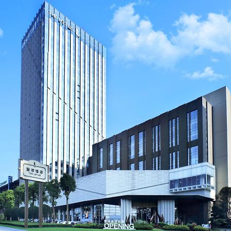Chongqing The Lotus Hotel Bagian luar foto