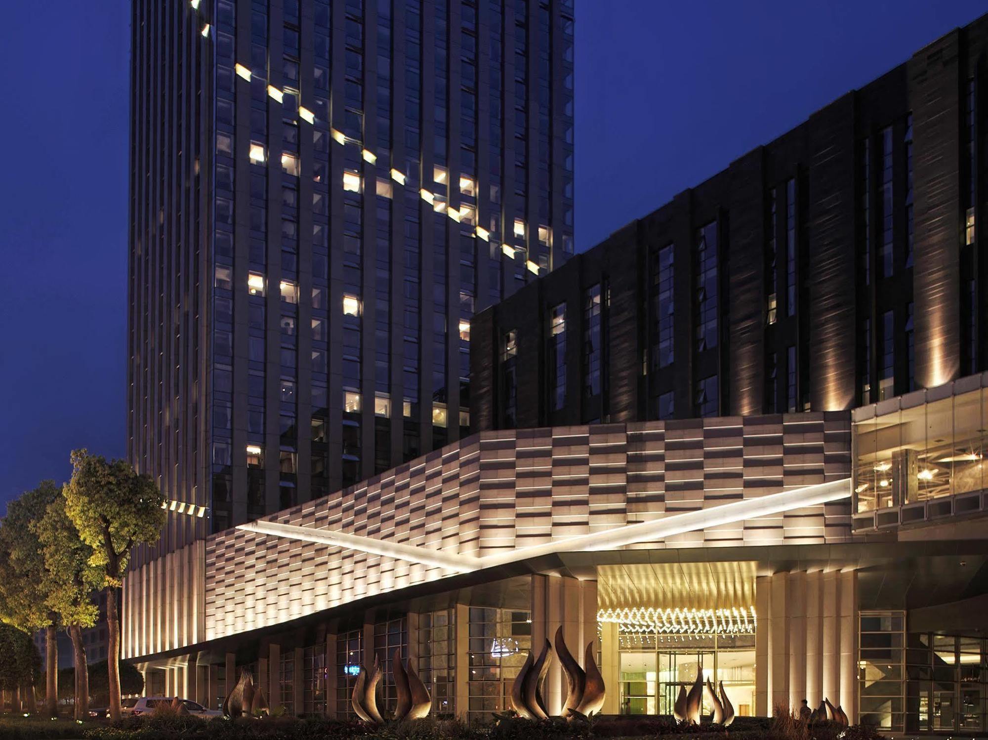 Chongqing The Lotus Hotel Bagian luar foto