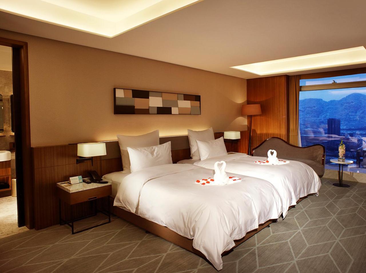 Chongqing The Lotus Hotel Bagian luar foto