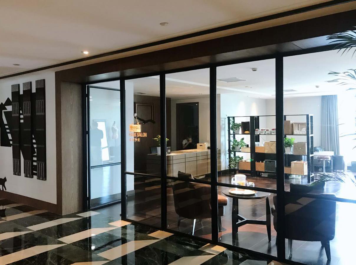 Chongqing The Lotus Hotel Bagian luar foto