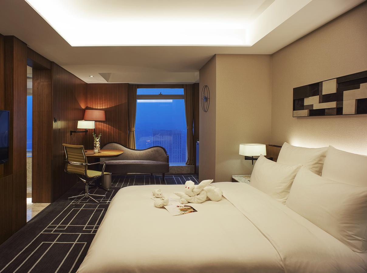 Chongqing The Lotus Hotel Bagian luar foto