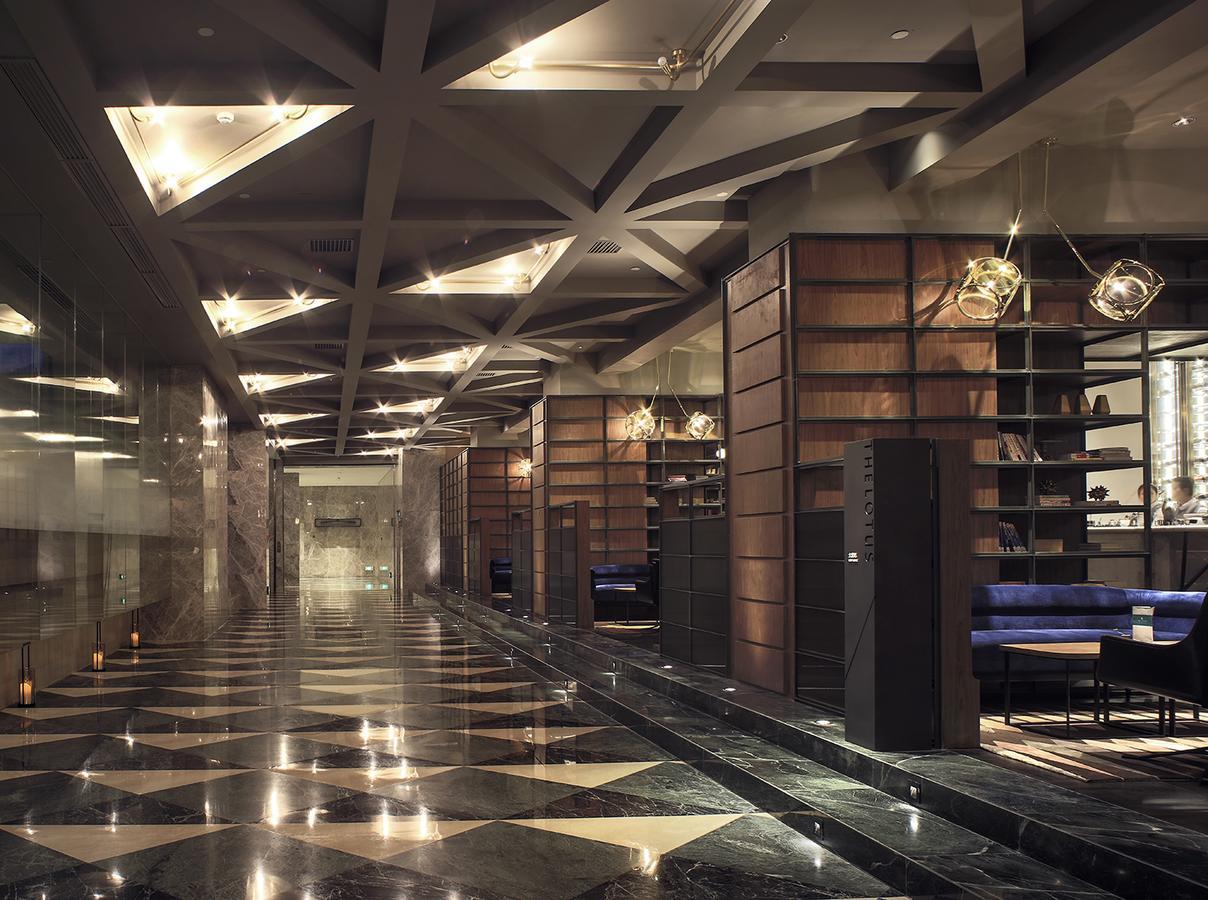 Chongqing The Lotus Hotel Bagian luar foto